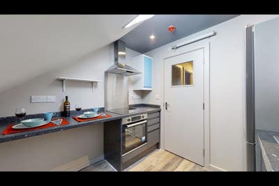 Room 6:  Modernly Furnished Room Main Photo