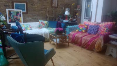 Yellow room with desk in large house with garden Main Photo