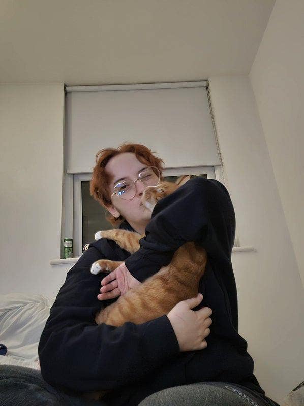 Couple with a lovely ginger cat ! Main Photo