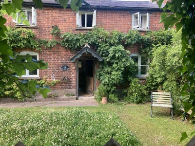A country home with an Aga kitchen. Main Photo