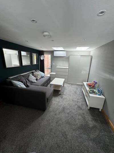 Annex with living room area, en-suite and Aircon Main Photo