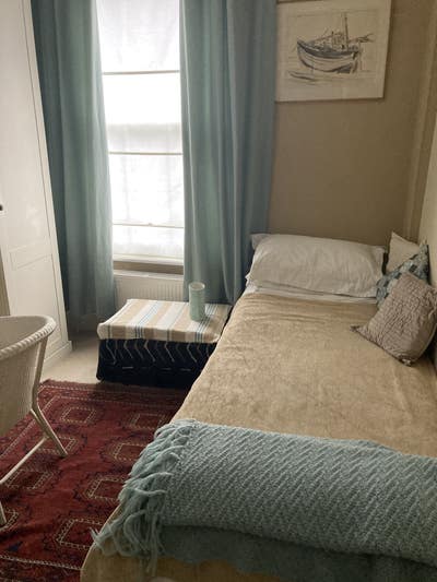 New to London? Cosy room in quiet home.  Main Photo