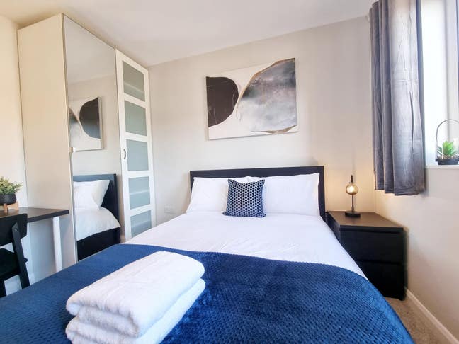 Three Bathrooms | Large and Stylish Double Bedroom Main Photo