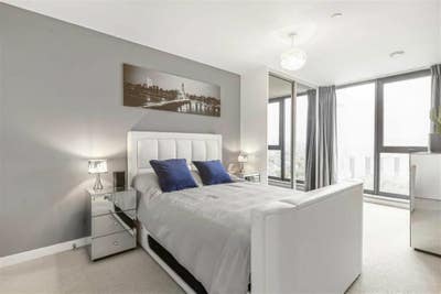 Master bedroom in modern Bermondsey flat Main Photo