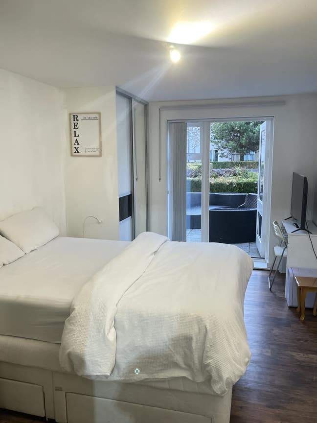 Modern En-Suite Room with Private Patio  Main Photo