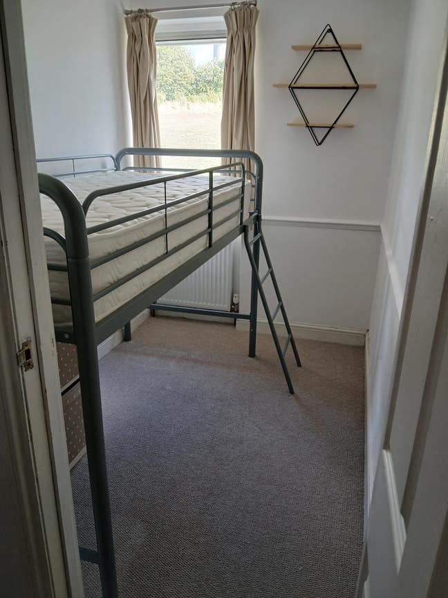 Very small room with bed available in family home. Main Photo