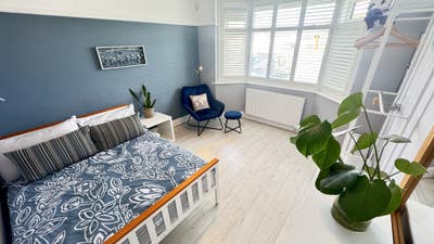 Large bedroom in beautiful, modern clean home. Main Photo