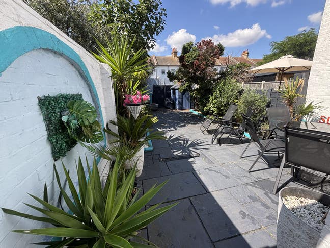 Beautiful house and garden  right by the sea  Main Photo