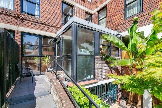 ✨ Charming 2-Bedroom Duplex with Private Garden ✨ Main Photo