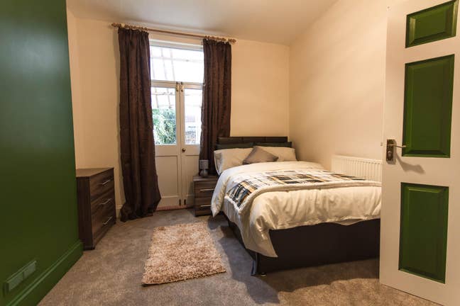Large double bed with French Doors in Southville Main Photo
