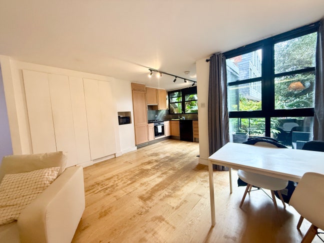 Large & Beautiful 2 Bed Garden Home in Zone 1! Main Photo