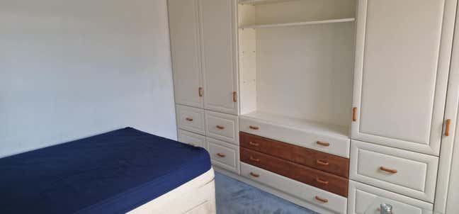Large double bedroom with fitted wardrobes. Main Photo