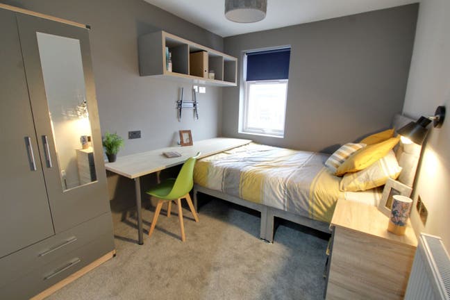 Hassle‑free modern rooms for working professionals Main Photo