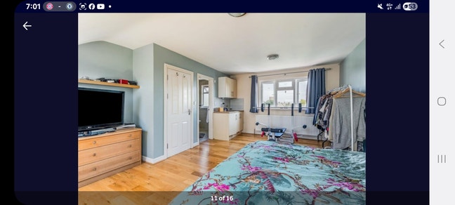 Large en-suite furnished bedroom with sink Main Photo
