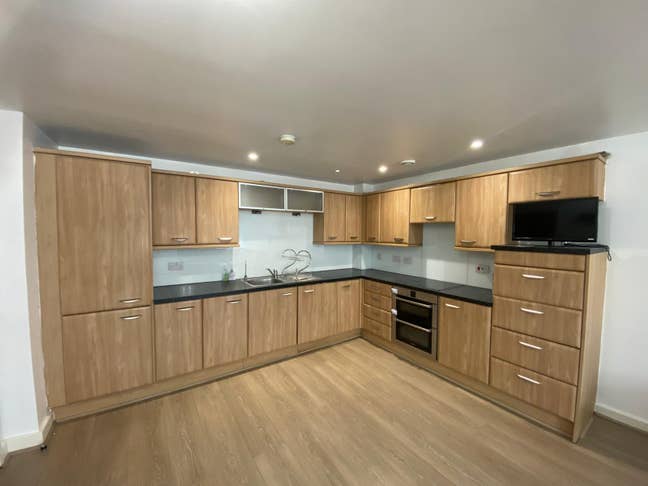 Two-Bedroom Third Floor Apartment with Parking - L Main Photo