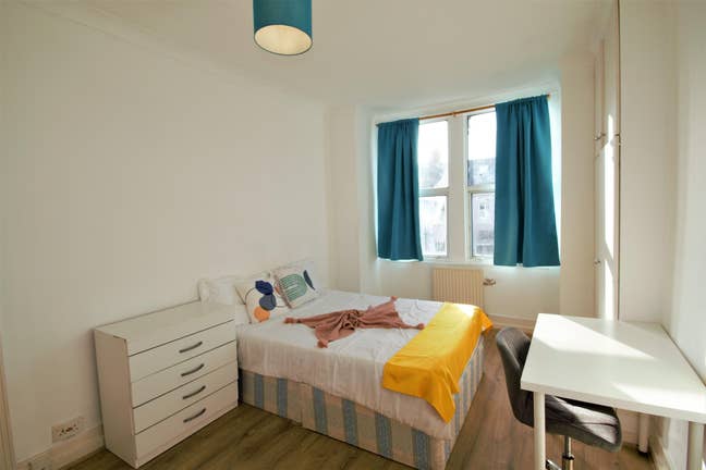 Fully Furnished, Large Room – All Bills Covered! Main Photo