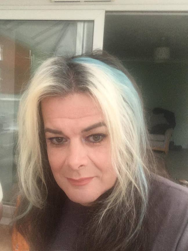 Re-transitioning trans woman with dog Main Photo