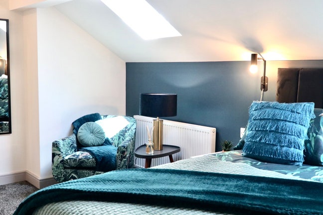 SS - Newly refurbished attic room.  Main Photo