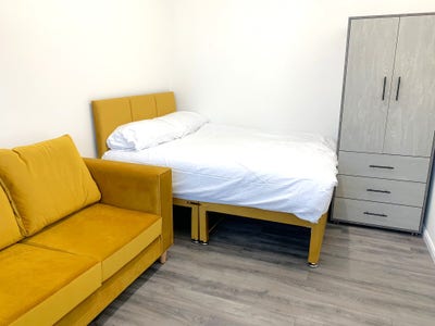 Double room with bed, wardrobe , desk & sofa Main Photo