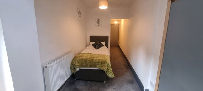 Modern room with own fridge freezer and TV Main Photo