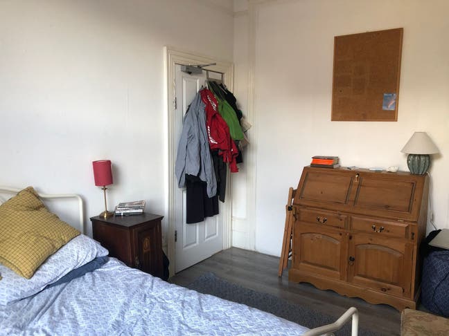 Bright double room in creative house Main Photo