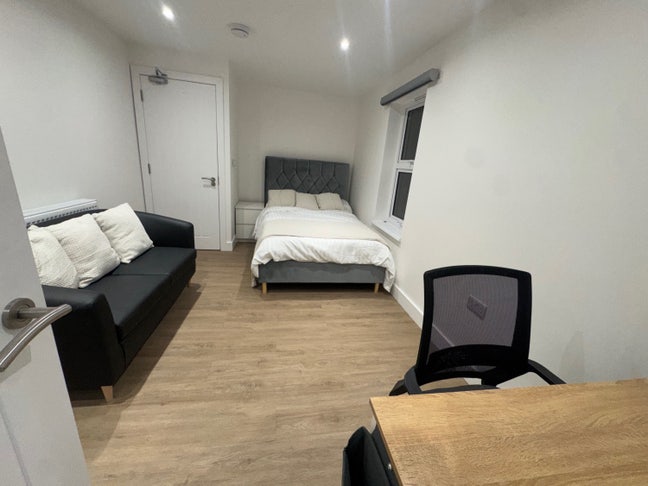 Huge room in newly developed house with sofa. Main Photo