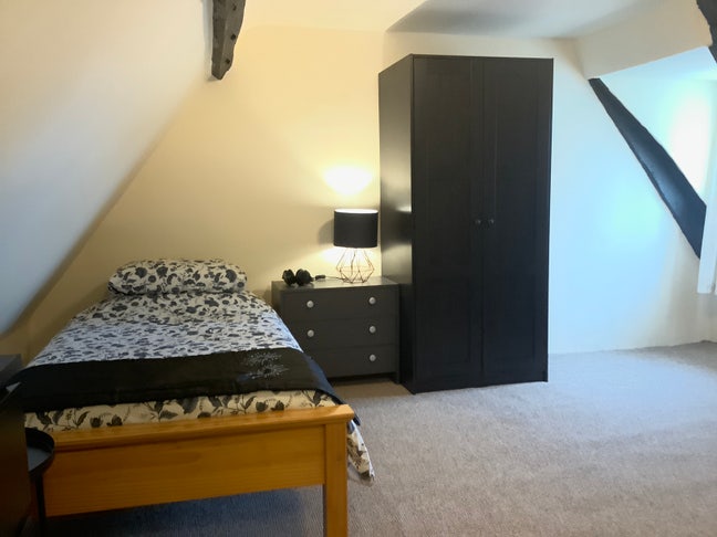 Quite and peaceful Attic Room in a Buddhist Centre Main Photo