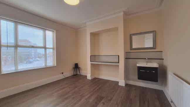 Furnished king-size room with sink vanity  Main Photo