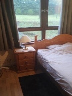 Furnished spacious room Double bed, lawn views. Main Photo