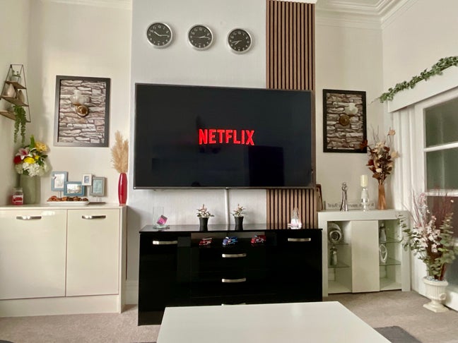 Massive bedroom with adjoining living room.  Main Photo