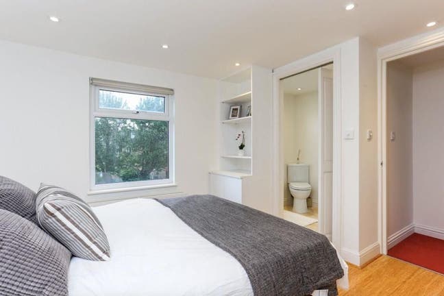 Ensuite with storage area in South Ealing Home  Main Photo