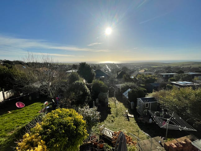 Sunny double room with huge garden and sea views Main Photo