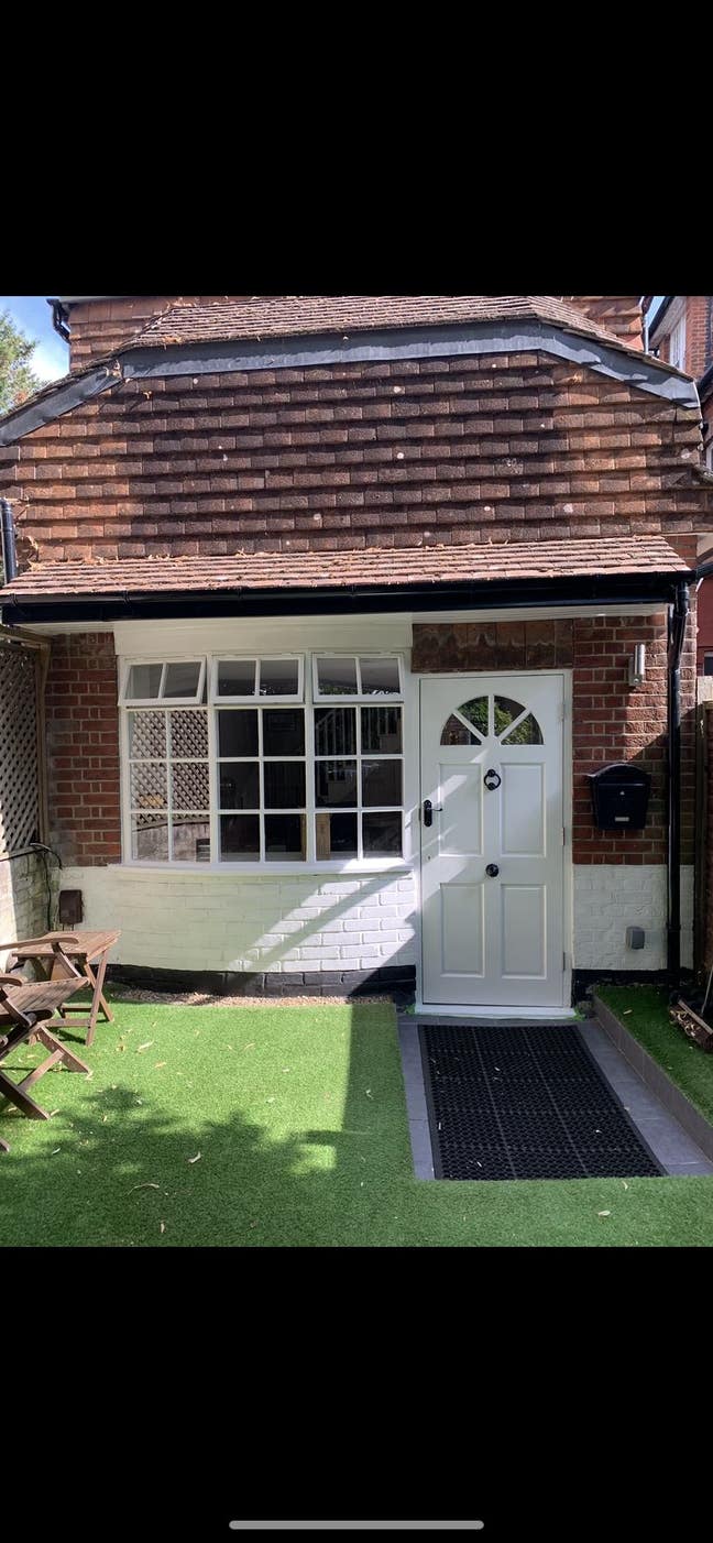 Detached share house set back from traffic in leaf Main Photo