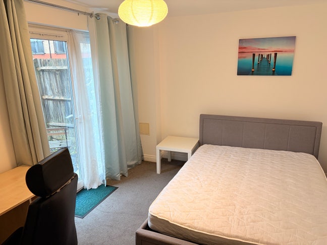 An En-suite with a garden access  Main Photo