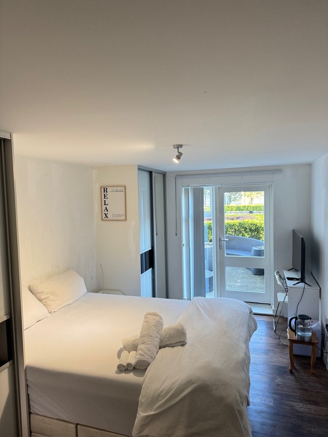 Modern En-Suite Room with Private Patio  Main Photo