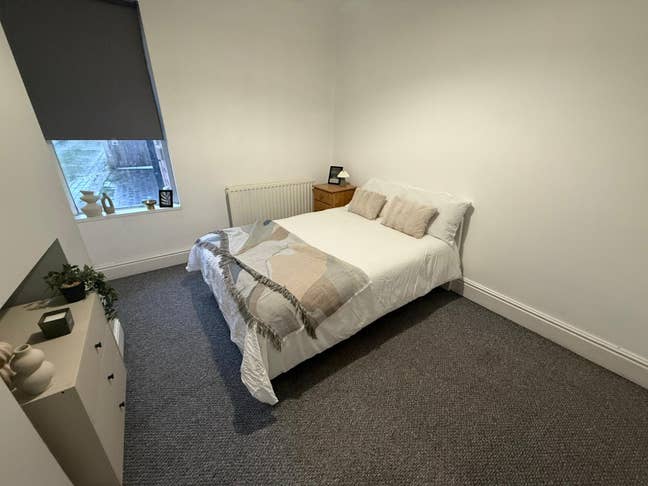A spacious, fully furnished bedroom  Main Photo
