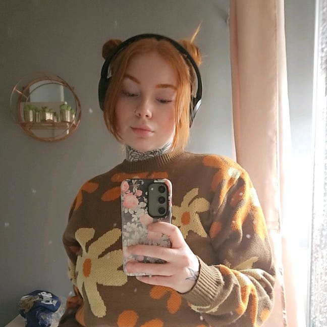 An individual with a small dog Main Photo