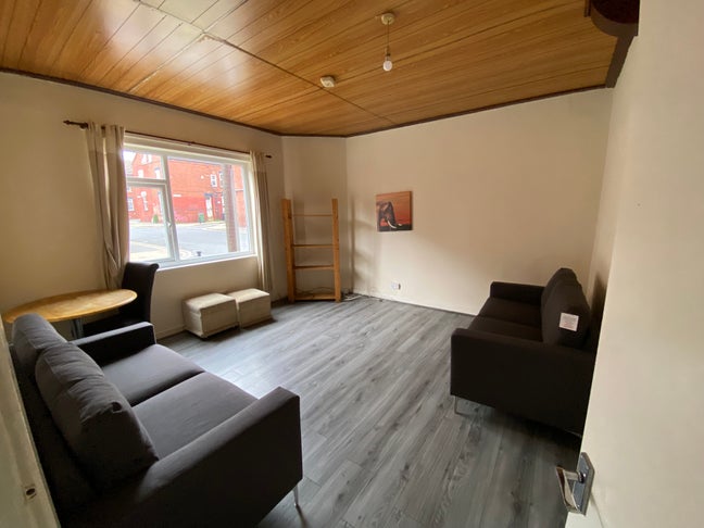 It’s the most spacious room in the apartment.  Main Photo