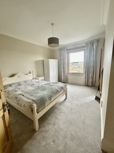 A gorgeous bedroom in a spacious home Main Photo