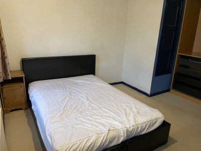 New double bed frame in spacious room Main Photo