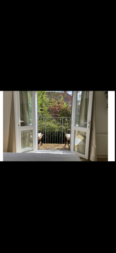 Room in a Warm and friendly apartment Main Photo