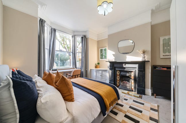 An Inviting Homey Room w/ Fireplace! Main Photo