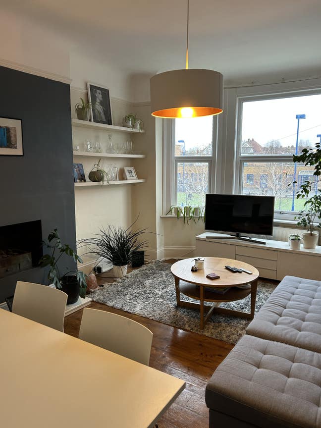 Large bedroom in a beautiful garden flat  Main Photo