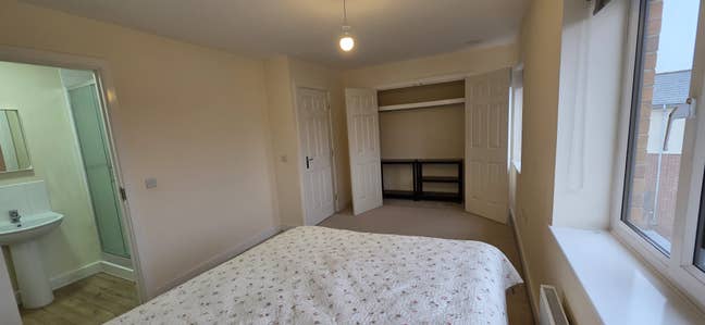 Spacious double bedroom with ensuite and storage Main Photo