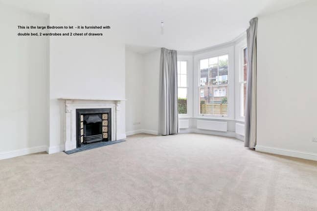 A very large bedroom with victorian fireplace Main Photo