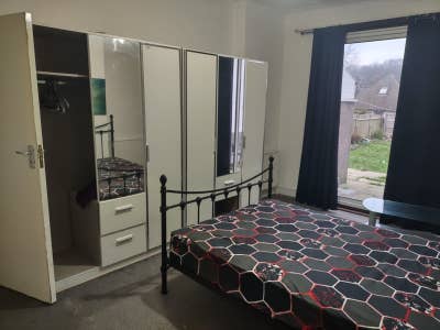 A wide spacious master bedroom  Main Photo