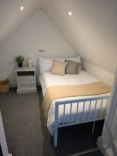 Top Floor room, with separate zones & storage. Main Photo