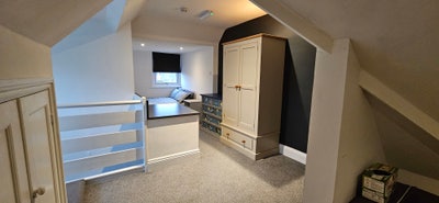 Top Floor room, with separate zones & storage. Main Photo