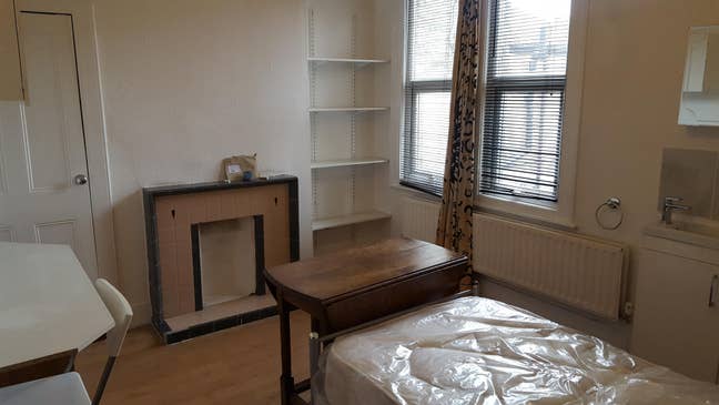 Highams Park bedroom inc Shower Main Photo