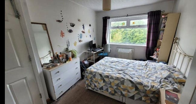 Double Bedroom Within a Spacious and Well-Maintain Main Photo